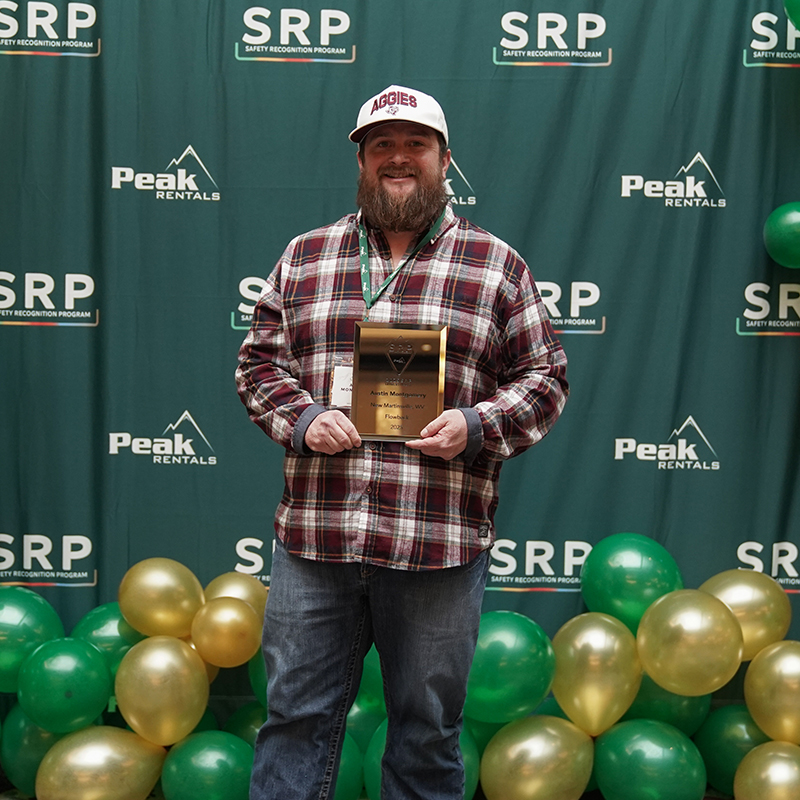 austin montgomery at SRP event holding award