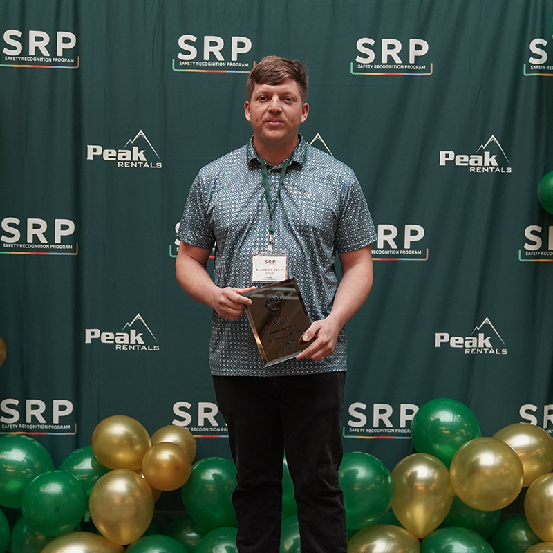 brandon odum at SRP event holding award