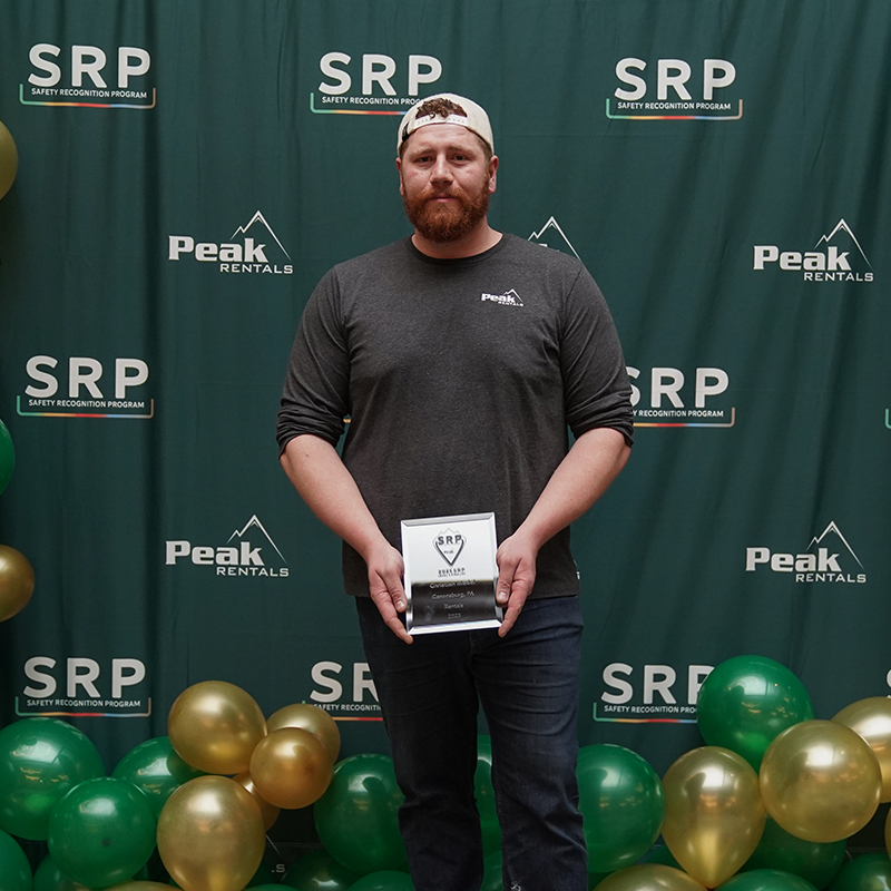 christian medel at SRP event holding award
