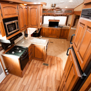 trailer house kitchen, desk, and other accommodations